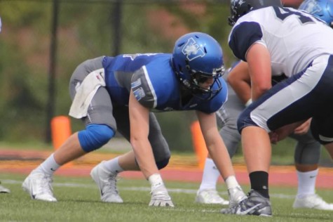 Varsity Football Dominates in Home Opener