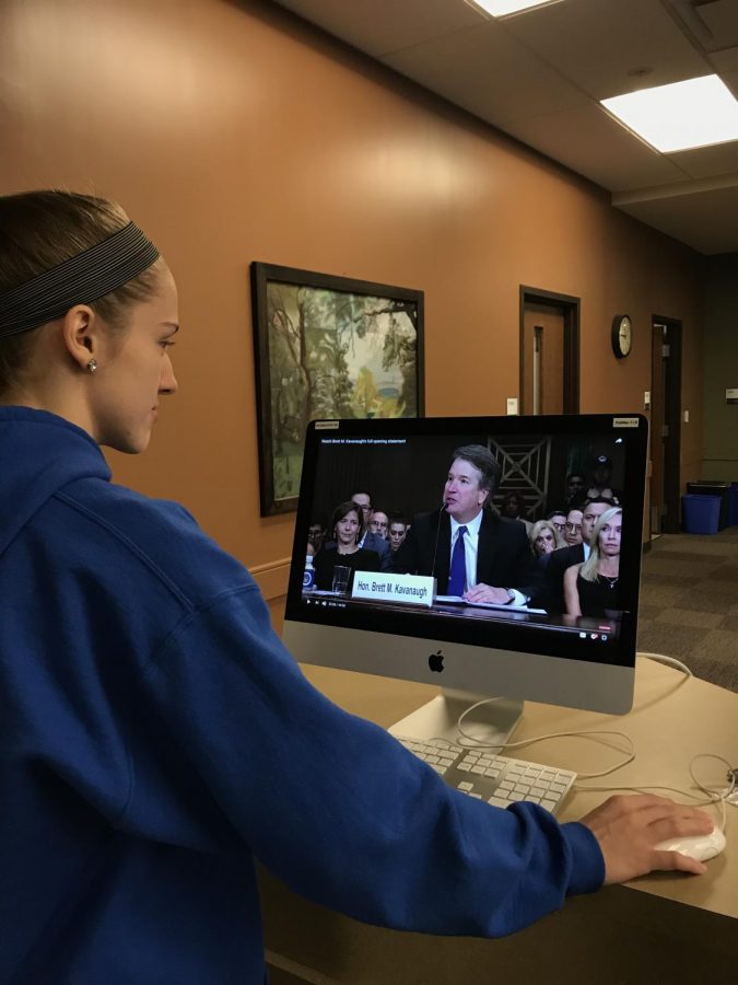 Junior, Allison Hardin, watches the Kavanaugh hearings on YouTube. 