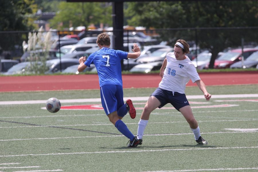 Sophomore, Caleb Legters, dribbles around defender in the Parkway Central Jamboree.