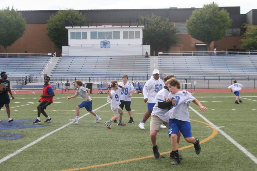 The seventh grade team learning how to play flex football at practice.