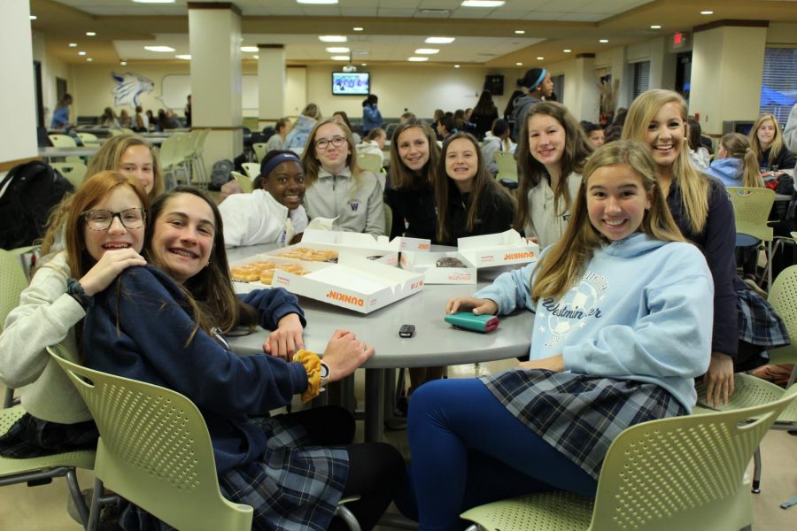 Ella Fiala and Katherine Kurop smile with their eighth grade PC group.