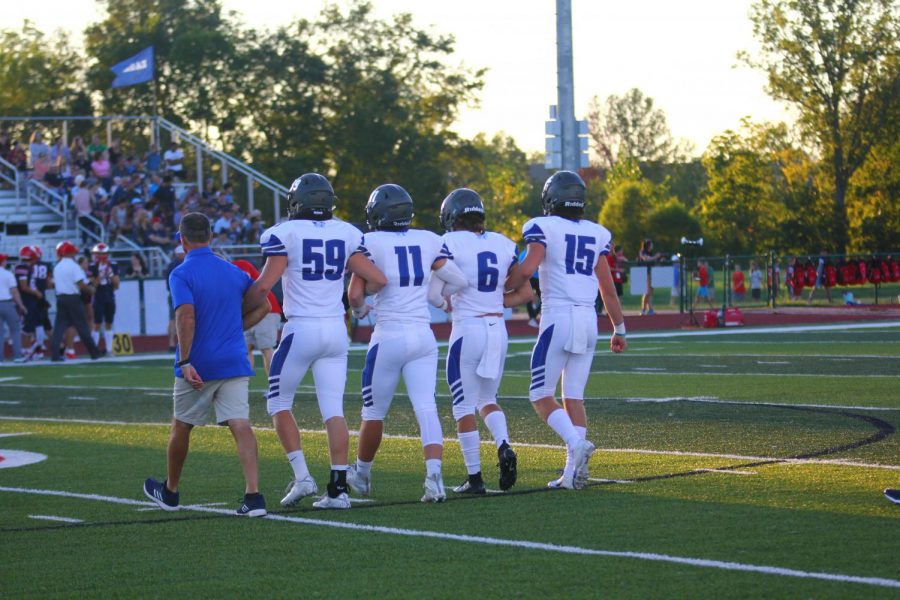 The captains take the field for the customary pregame meetings before the team's previous journey to the St. Charles area, one that ended in pure heartbreak for the good guys.