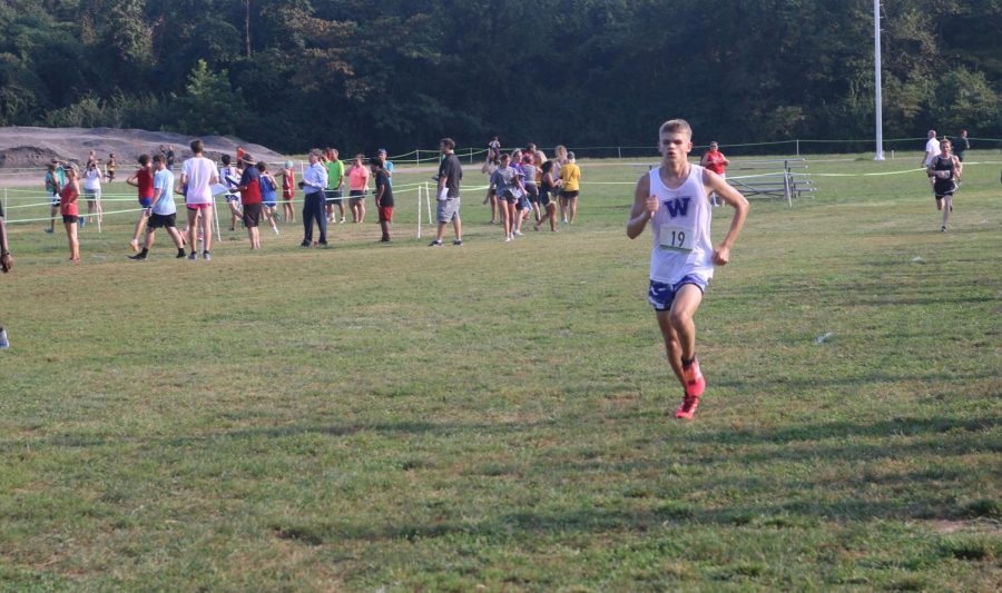 Thomas Gorline finishes a race at the Spanish Lakes course in North St. Louis.