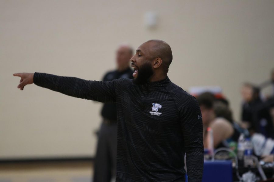 Coach Pitts yells out instructions to his JV boys basketball team.