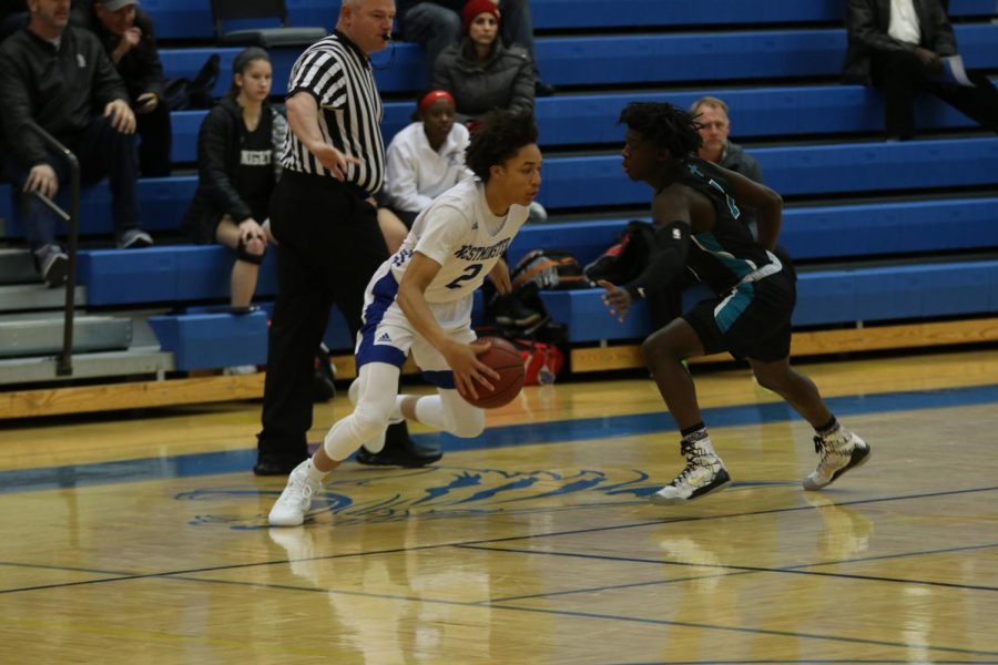 Sophomore EJ Williams, one of only four players on the Westminster roster with considerable varsity experience, handles the ball against Christian High School.