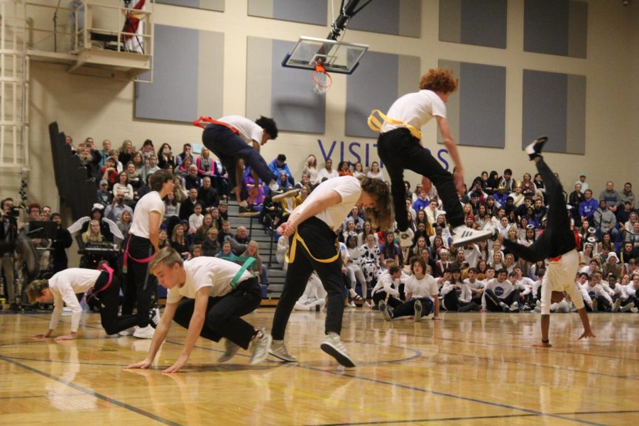 The Class of 2021 performs boys poms during Spirit Week last year.