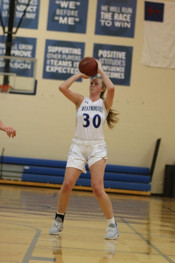 Carlie Vick, the star of Friday night's game against Parkway North shoots a midrange jumper during a game against Duchesne High School.