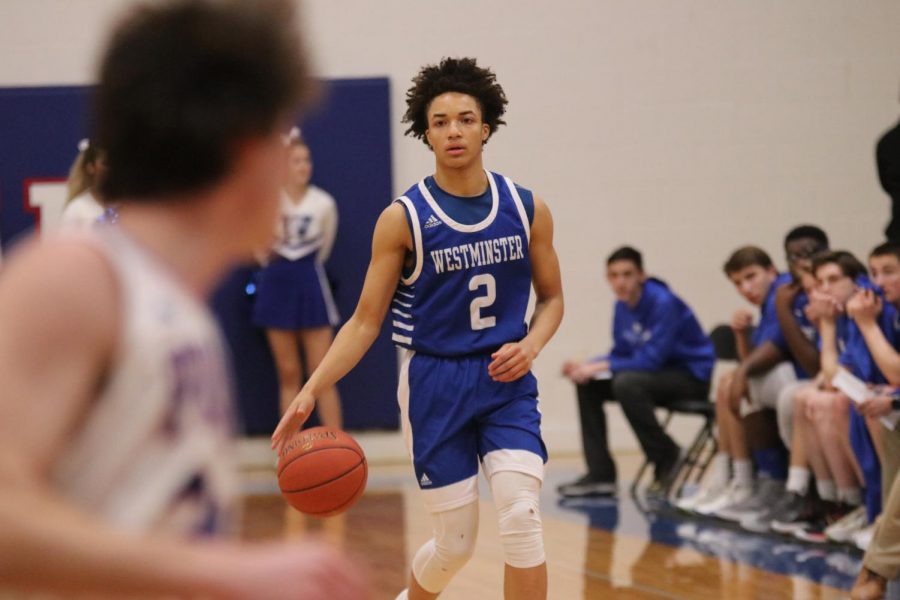 EJ Williams brings the ball up the floor in a game against Priory on Tuesday, January 21. 