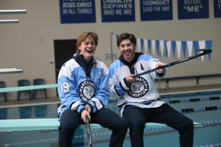 Assistant captains Jack Bystrom and Ben Parres pose for a photo on the diving board.