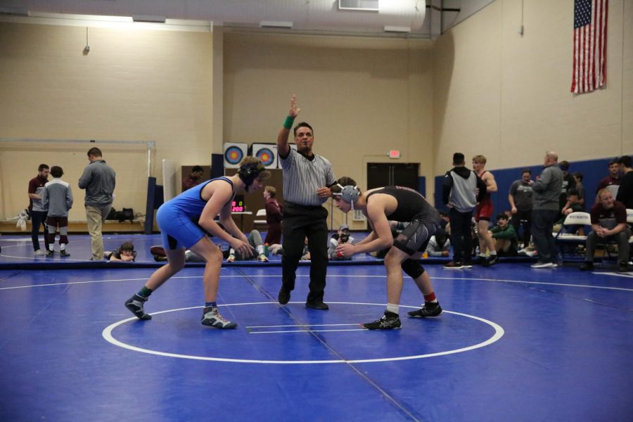 Kirk Briden begins a match during an early-season tournament.