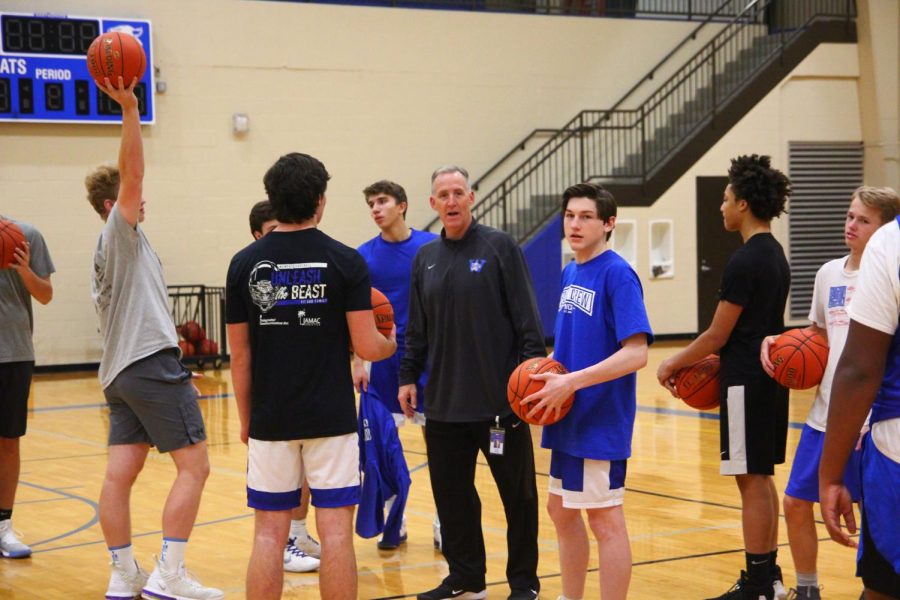 Coach Ribble instructs the team before shoot around.