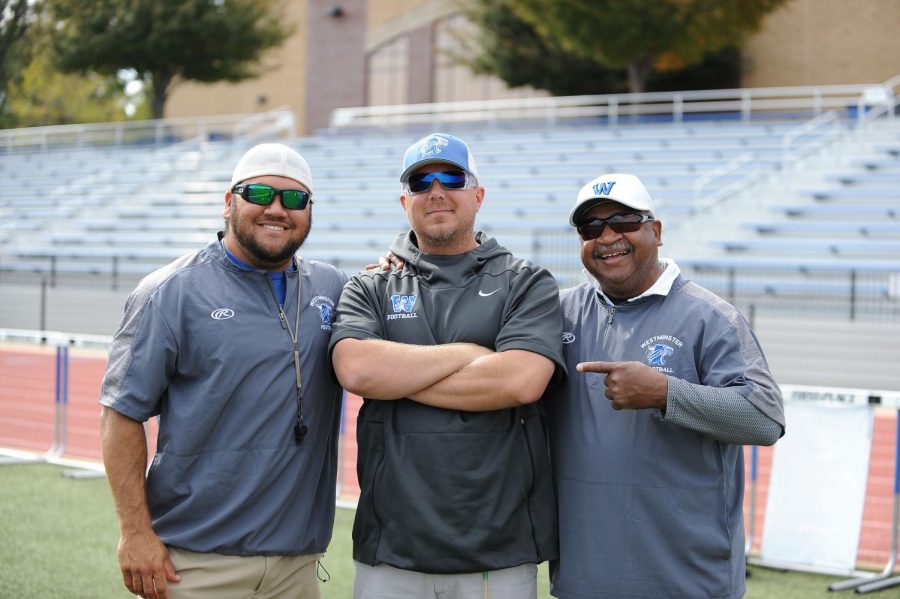 Coach Decker with the defensive coaches.