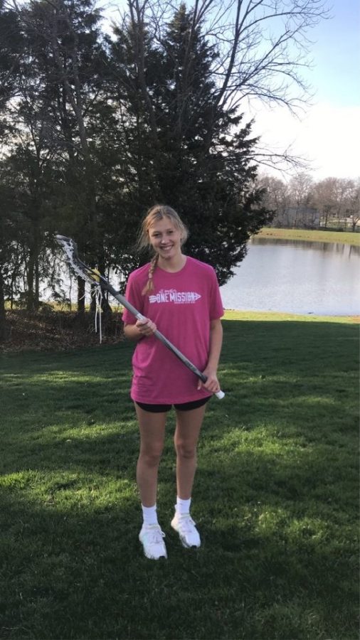 Marty%2C+carrying+her+lacrosse+stick+as+there+is+currently+no+practices+at+school.