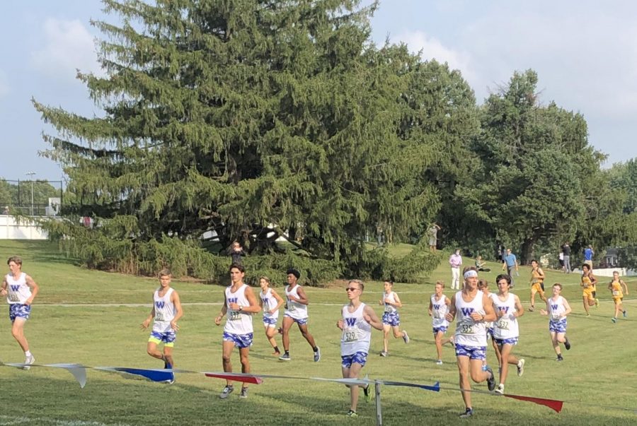 The Boys Cross Country Team warms up before the Eagle- Crusader Invitational.