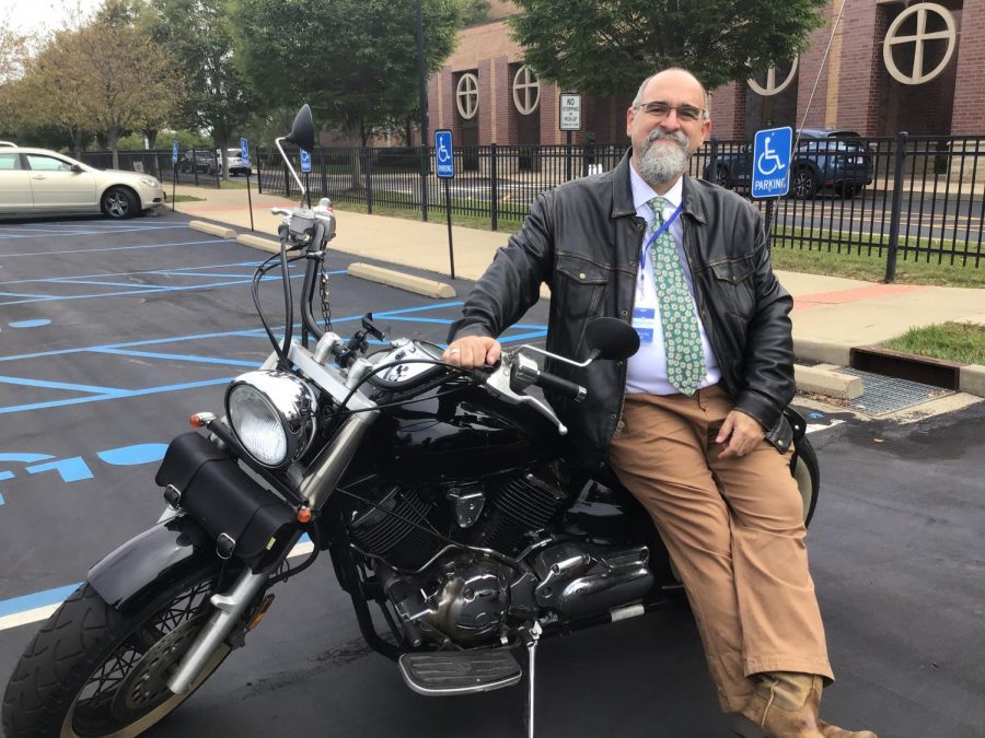 Mr. Wolfe enjoys riding his motorcycle to school on sunny days. 