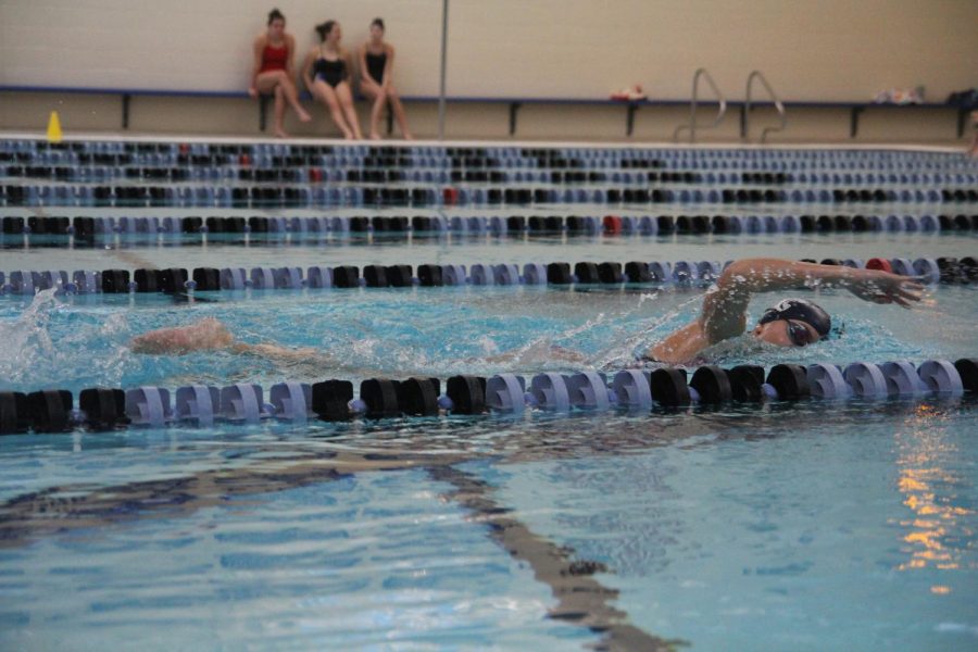 Allie Lytle, senior, swims the 500 for time trials at practice.