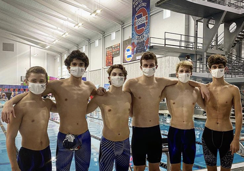 The boys swim team competes at state on November 15th.