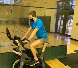 Caleb Moellenhoff cross trains as he works hard to stay in shape while recovering from injury.