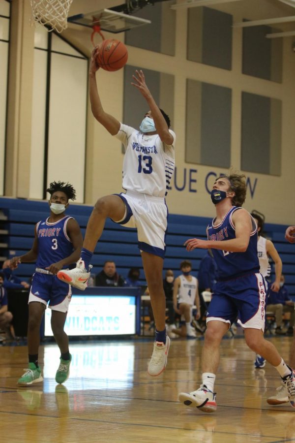 Caleb Thompson lays one in on a fast break.