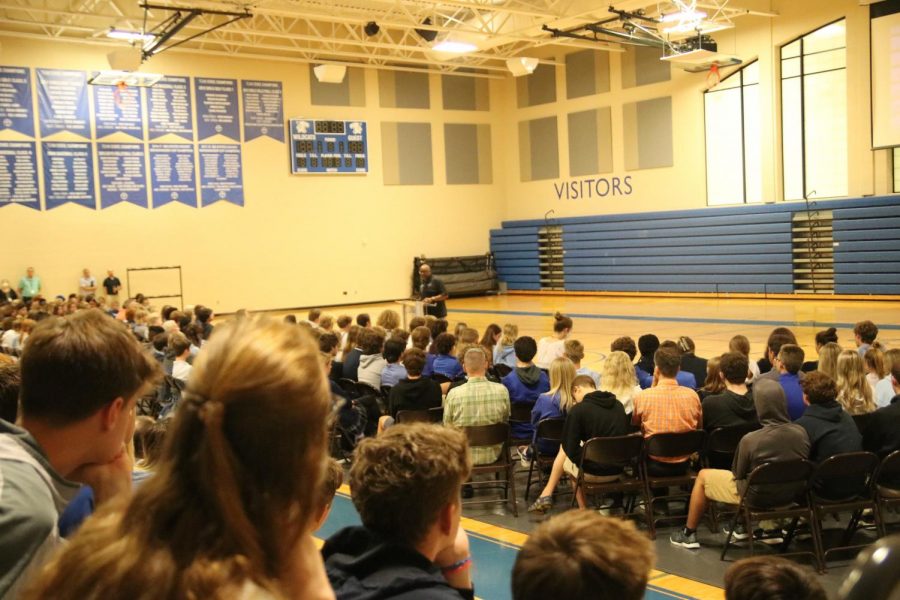 Upper school students listen to the second in-person chapel of the 2021-22 school year with Football Coach and Asst. Dean of Students, Mr. Butler Bynote, speaking.