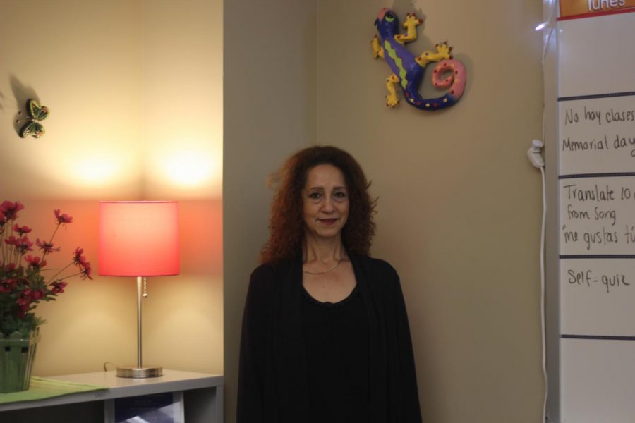 Senra Meeks, standing in her classroom getting ready to begin classes. 