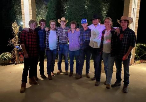 Senior Guys pose in their best barn bash attire, at the senior homecoming banquet which was barn bashed themed. 