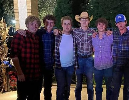 Senior Guys pose in their best barn bash attire, at the senior homecoming banquet which was barn bashed themed.
