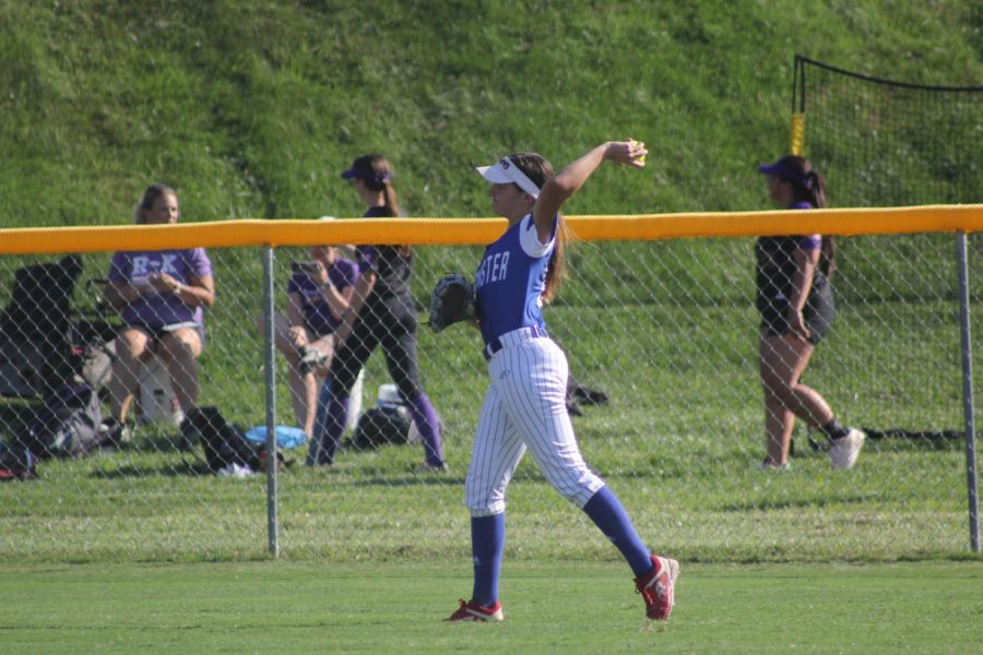 A softball team member readies up her pitch.