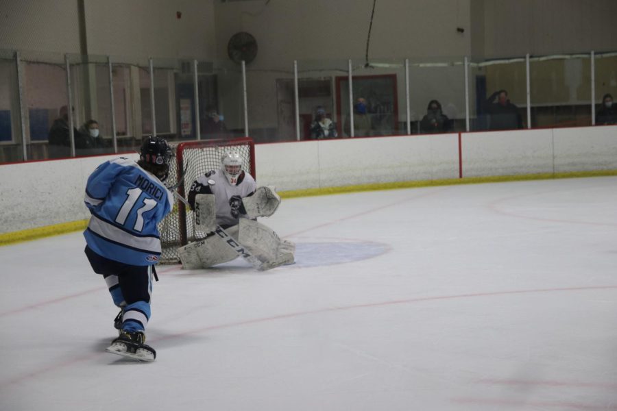 Joey Morici takes a shot on goal 