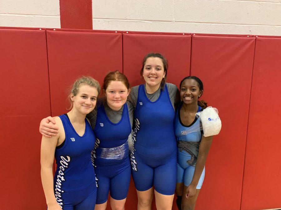 The girls wrestling team: (L-R) Kate Van Zee, Katherine Shaw, Denny Muehleisen, Kyndal Brown.