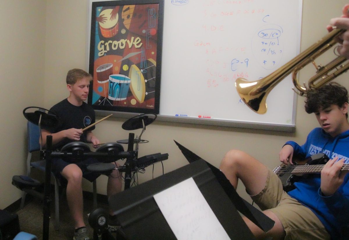 One of the many small ensembles gather in a practice room.