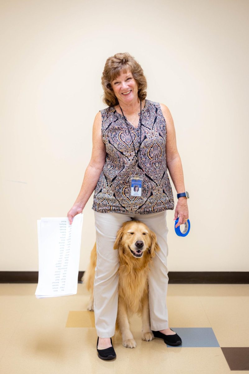 Millie and her owner, Mrs. Brown, laughing.