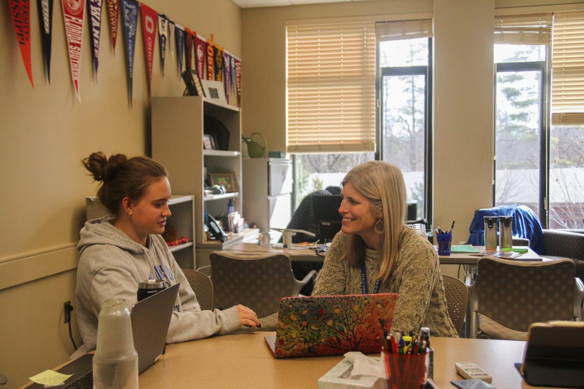 Karen Pollack meets with Sadie Schmidt, Senior, in her office