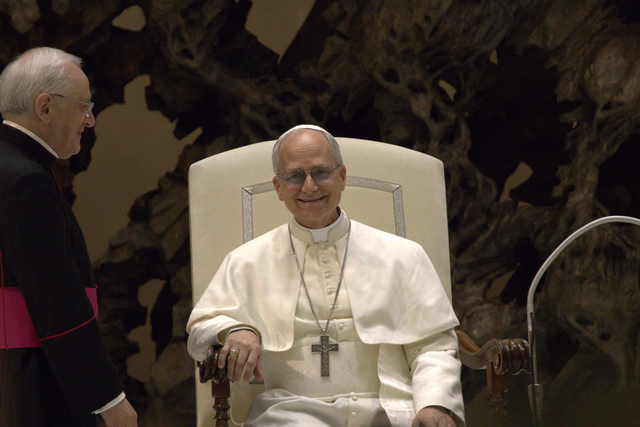 The New Pope Leo XIV Sits Happily In His Chair After Accepting His Papacy