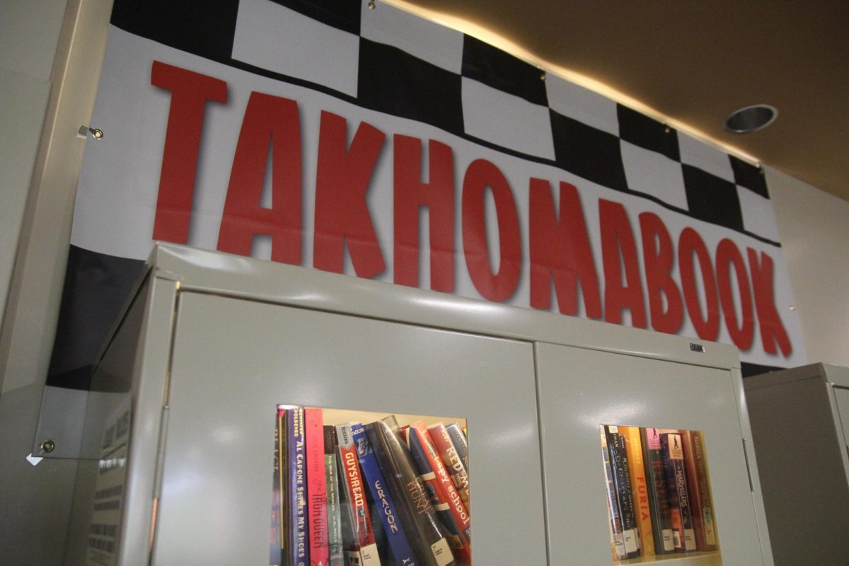 Mr. Wolfe's new middle school library called "TAKAHOMABOOK" in the 8th grade commons.