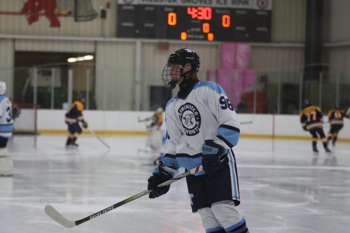 Nathan Charnes skating pre game against John Burroughs 