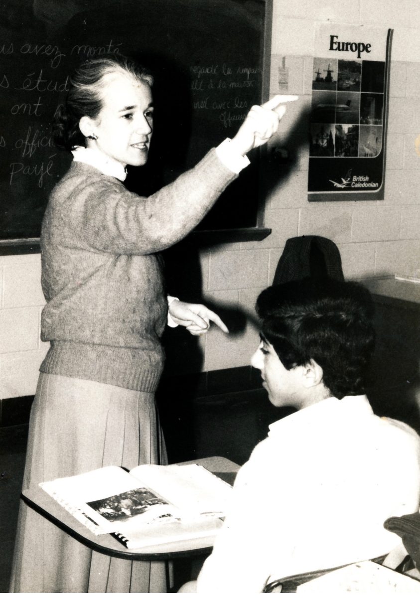 Mrs. Florence Lewis, Mrs. Vogel’s mom, teaching her French class about forming sentences.