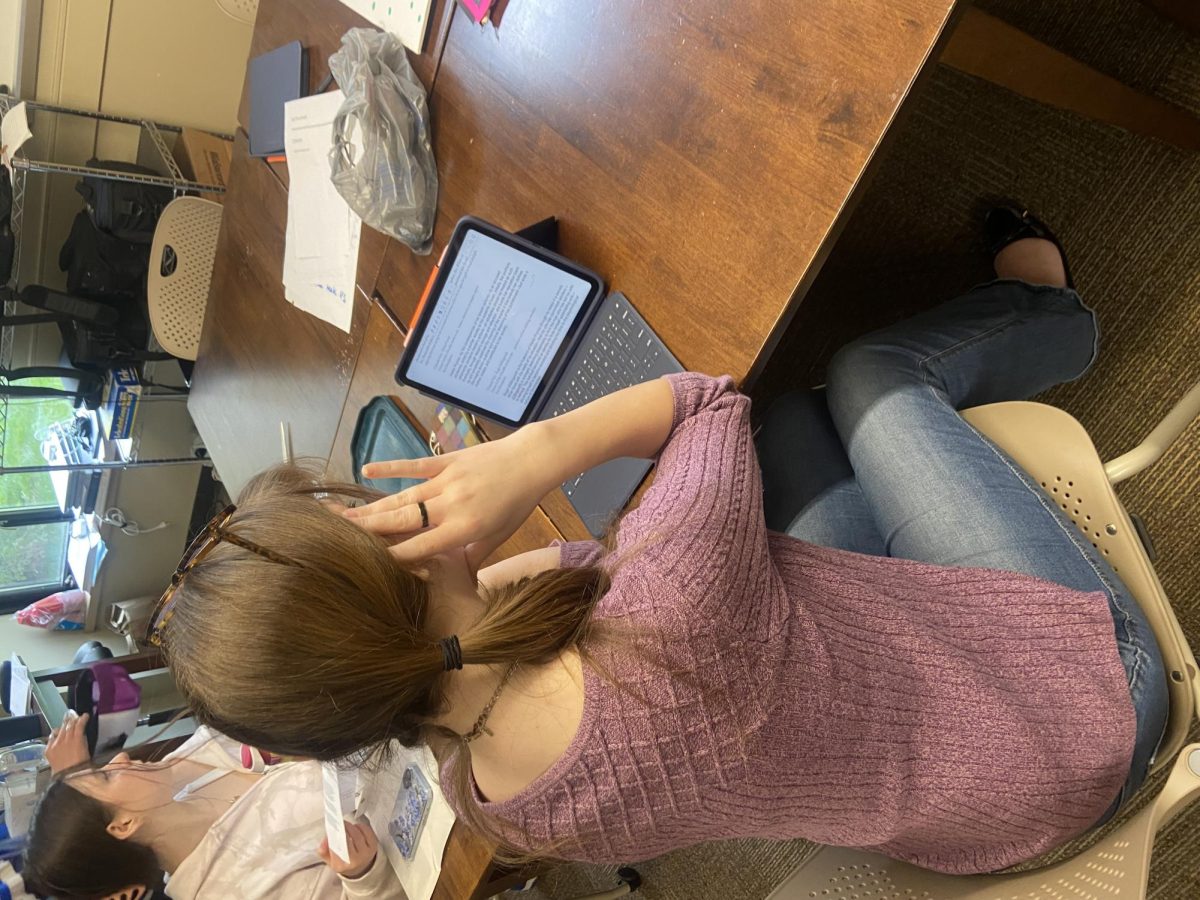 A girl who is stressed out about the end of the year and finals.